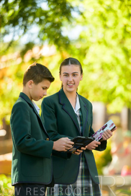 January 2024 / Students-x2-with-Pad-standing-outdors_240122_Z9E6464