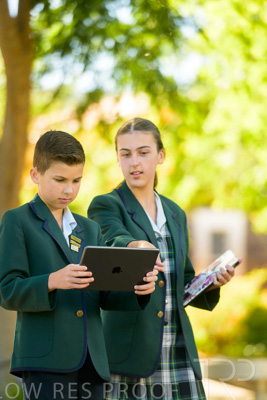 January 2024 / Students-x2-with-Pad-standing-outdors_240122_Z9E6542