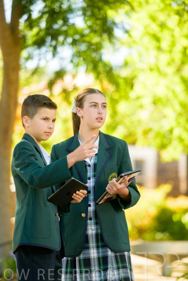 January 2024 / Students-x2-with-Pad-standing-outdors_240122_Z9E6664