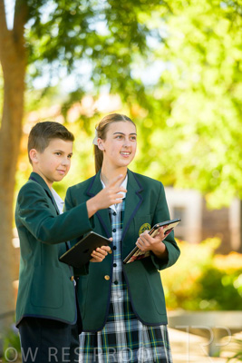 January 2024 / Students-x2-with-Pad-standing-outdors_240122_Z9E6667