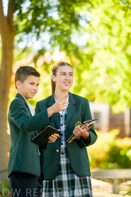 January 2024 / Students-x2-with-Pad-standing-outdors_240122_Z9E6670