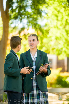 January 2024 / Students-x2-with-Pad-standing-outdors_240122_Z9E6684