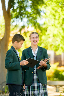 January 2024 / Students-x2-with-Pad-standing-outdors_240122_Z9E6701