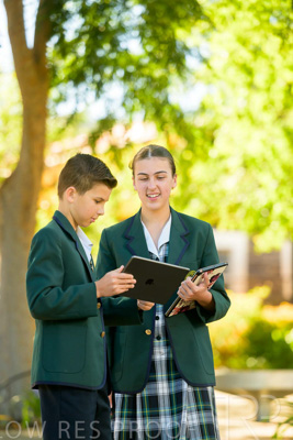 January 2024 / Students-x2-with-Pad-standing-outdors_240122_Z9E6707