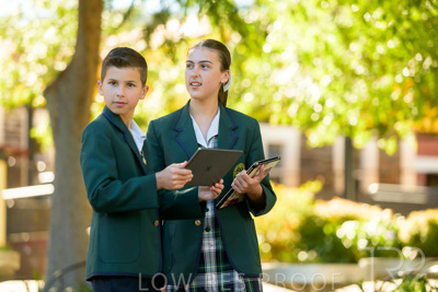 January 2024 / Students-x2-with-Pad-standing-outdors_240122_Z9E6765