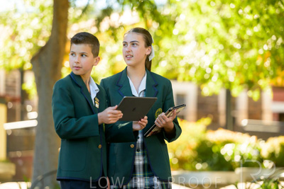 January 2024 / Students-x2-with-Pad-standing-outdors_240122_Z9E6772