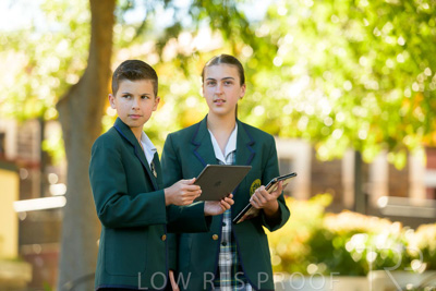 January 2024 / Students-x2-with-Pad-standing-outdors_240122_Z9E6783