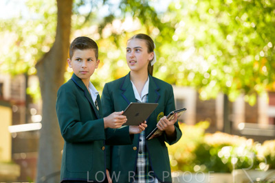 January 2024 / Students-x2-with-Pad-standing-outdors_240122_Z9E6791