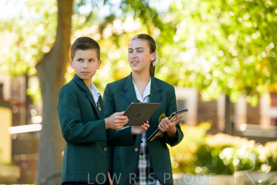 January 2024 / Students-x2-with-Pad-standing-outdors_240122_Z9E6803