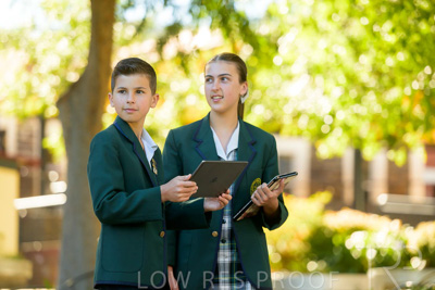 January 2024 / Students-x2-with-Pad-standing-outdors_240122_Z9E6861