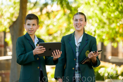 January 2024 / Students-x2-with-Pad-standing-outdors_240122_Z9E6900