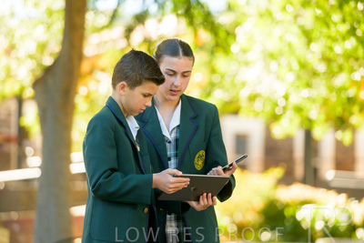 January 2024 / Students-x2-with-Pad-standing-outdors_240122_Z9E6906