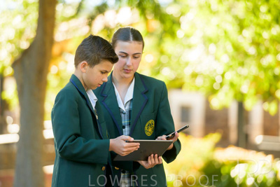 January 2024 / Students-x2-with-Pad-standing-outdors_240122_Z9E6911