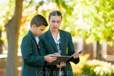 January 2024 / Students-x2-with-Pad-standing-outdors_240122_Z9E6912