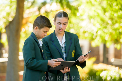 January 2024 / Students-x2-with-Pad-standing-outdors_240122_Z9E6914