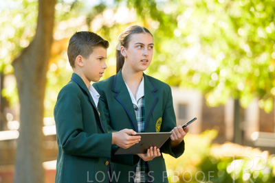 January 2024 / Students-x2-with-Pad-standing-outdors_240122_Z9E6923