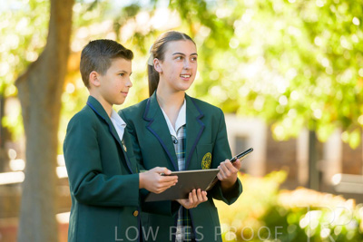 January 2024 / Students-x2-with-Pad-standing-outdors_240122_Z9E6929