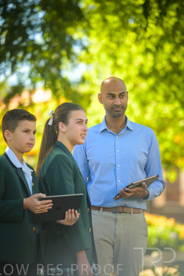 January 2024 / Teacher-and-2-Students-Standing-Outdoors_240122_Z9E6958