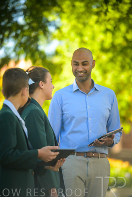 January 2024 / Teacher-and-2-Students-Standing-Outdoors_240122_Z9E6970