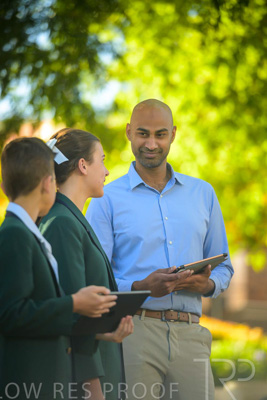 January 2024 / Teacher-and-2-Students-Standing-Outdoors_240122_Z9E6975