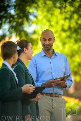 January 2024 / Teacher-and-2-Students-Standing-Outdoors_240122_Z9E6982