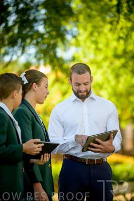 January 2024 / Teacher-and-2-Students-Standing-Outdoors_240122_Z9E7084