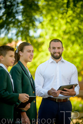 January 2024 / Teacher-and-2-Students-Standing-Outdoors_240122_Z9E7140