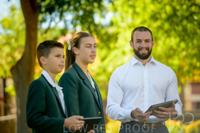 January 2024 / Teacher-and-2-Students-Standing-Outdoors_240122_Z9E7148