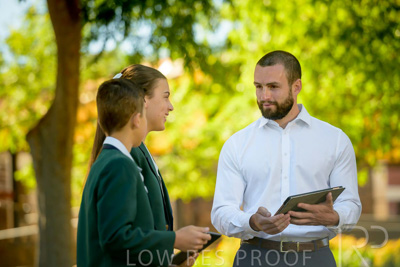January 2024 / Teacher-and-2-Students-Standing-Outdoors_240122_Z9E7165