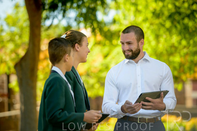 January 2024 / Teacher-and-2-Students-Standing-Outdoors_240122_Z9E7167