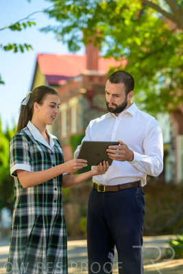 January 2024 / Teacher-with-1-Student-Standing-Outdoors_240122_Z9E7327