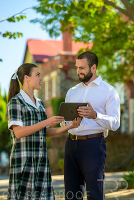 January 2024 / Teacher-with-1-Student-Standing-Outdoors_240122_Z9E7334