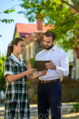 January 2024 / Teacher-with-1-Student-Standing-Outdoors_240122_Z9E7337