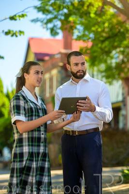 January 2024 / Teacher-with-1-Student-Standing-Outdoors_240122_Z9E7339