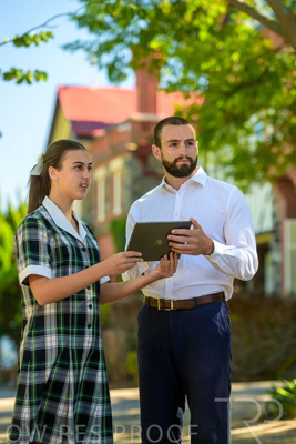January 2024 / Teacher-with-1-Student-Standing-Outdoors_240122_Z9E7342