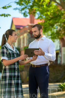 January 2024 / Teacher-with-1-Student-Standing-Outdoors_240122_Z9E7365