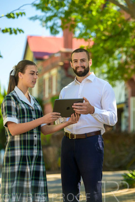 January 2024 / Teacher-with-1-Student-Standing-Outdoors_240122_Z9E7372