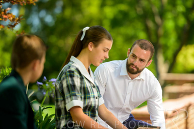 January 2024 / Teacher-with-2-Student-Sitting-Outdoors_240122_Z9E7889
