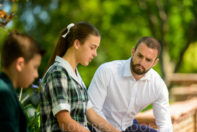 January 2024 / Teacher-with-2-Student-Sitting-Outdoors_240122_Z9E7914