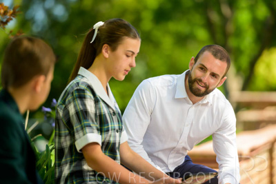 January 2024 / Teacher-with-2-Student-Sitting-Outdoors_240122_Z9E7931