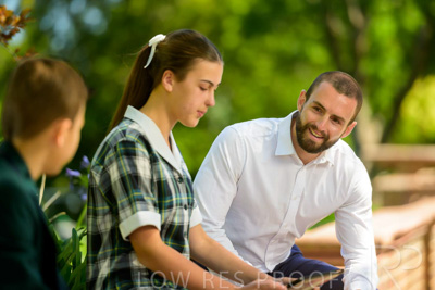 January 2024 / Teacher-with-2-Student-Sitting-Outdoors_240122_Z9E7933