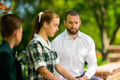 January 2024 / Teacher-with-2-Student-Sitting-Outdoors_240122_Z9E7940
