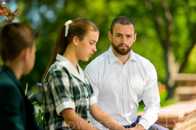 January 2024 / Teacher-with-2-Student-Sitting-Outdoors_240122_Z9E7944