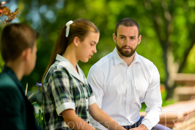 January 2024 / Teacher-with-2-Student-Sitting-Outdoors_240122_Z9E7949