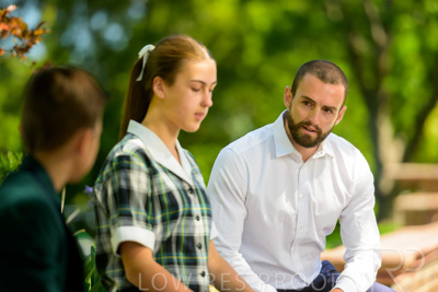 January 2024 / Teacher-with-2-Student-Sitting-Outdoors_240122_Z9E7975