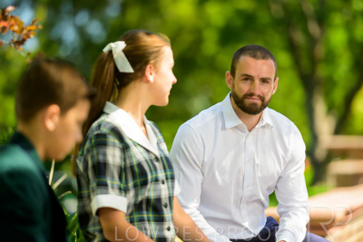 January 2024 / Teacher-with-2-Student-Sitting-Outdoors_240122_Z9E8005