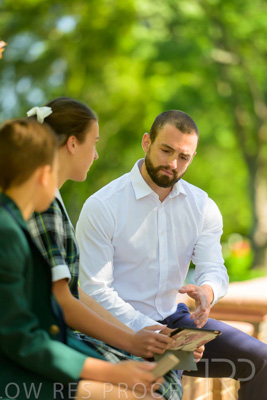 January 2024 / Teacher-with-2-Student-Sitting-Outdoors_240122_Z9E8208