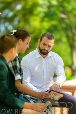 January 2024 / Teacher-with-2-Student-Sitting-Outdoors_240122_Z9E8215