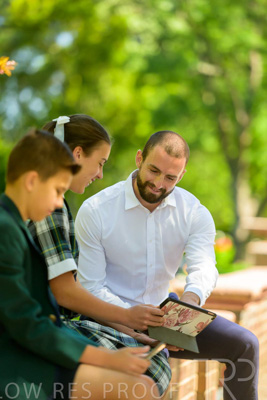 January 2024 / Teacher-with-2-Student-Sitting-Outdoors_240122_Z9E8221