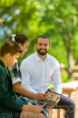 January 2024 / Teacher-with-2-Student-Sitting-Outdoors_240122_Z9E8230